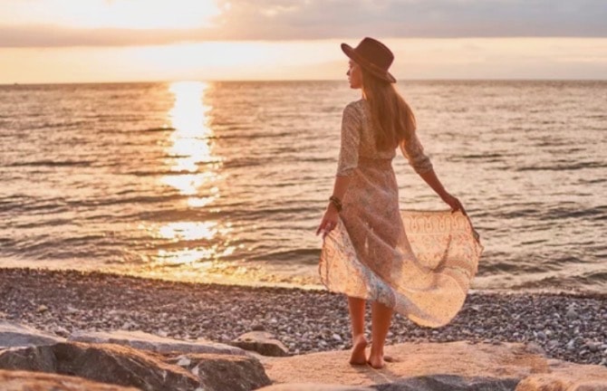 Flowing dress at sunset beach